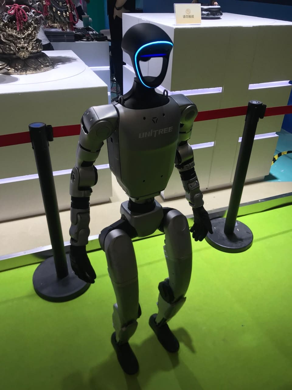 A Unitree humanoid robot at a technology showcase